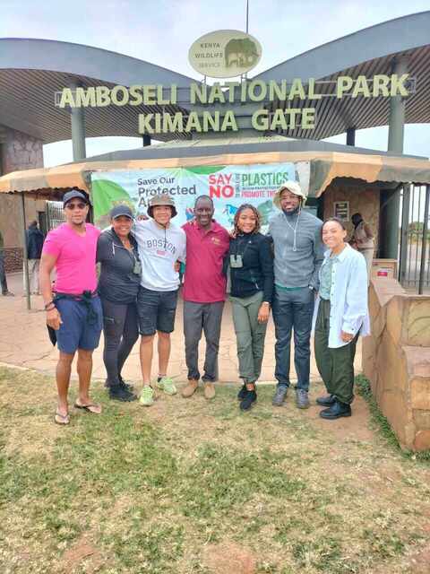 Group photo at Amboseli National Park — safari travelers in Kenya